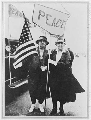 Jane Addams holding the U.S. flag